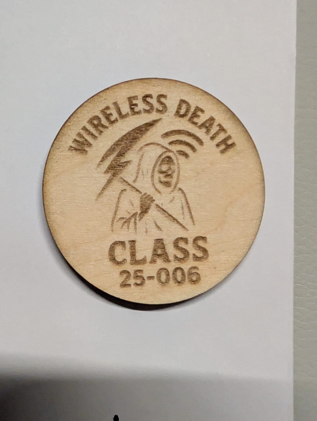 Wireless Death class coin, engraved birch